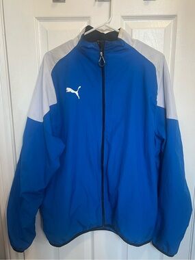 Puma Men's Blue Windbreaker Jacket with White Accents - Size US L